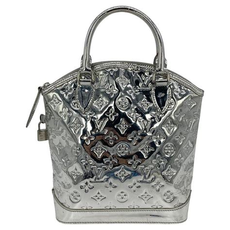 louis vuitton silver lockit